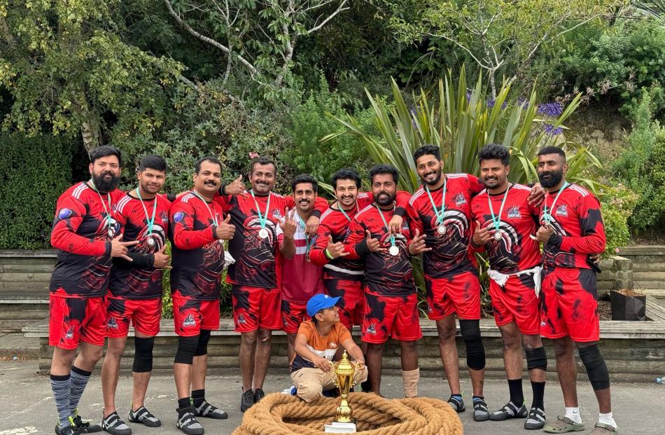 Oamaru Spartans team with the Second price trophy