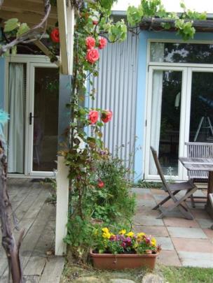 This paved area by the veranda is a perfect spot for brunch.