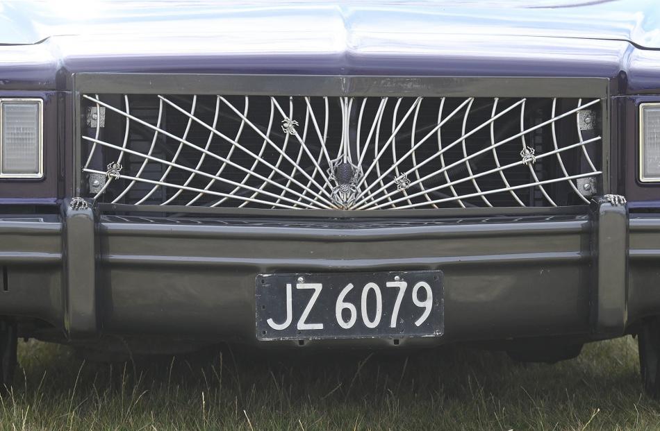 A depiction of spiders and a web form the grille of the 1977 Buick Century belonging to Aaron...