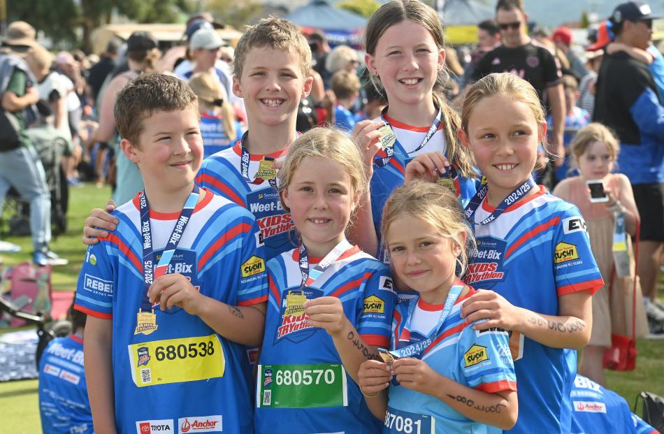Proud of their triathlon efforts are the Thelning cousins from Maheno School (clockwise from...