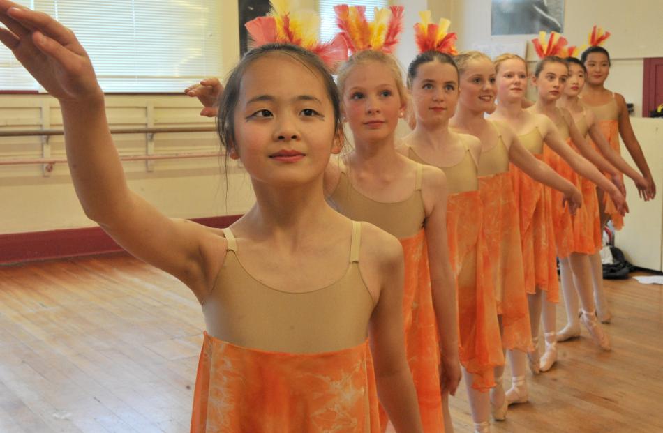 Dancers (from left) Ruth Huang (12), Lauren Buttery (12), Summer Paulin (11), Jessica Larkins (12...