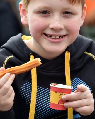 Lockie Emmerson, 8, of Dunedin, enjoys a snack.