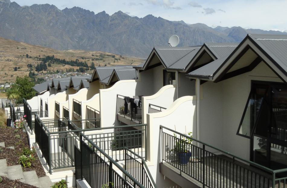 The south wall of this Queenstown apartment complex is to be reclad.