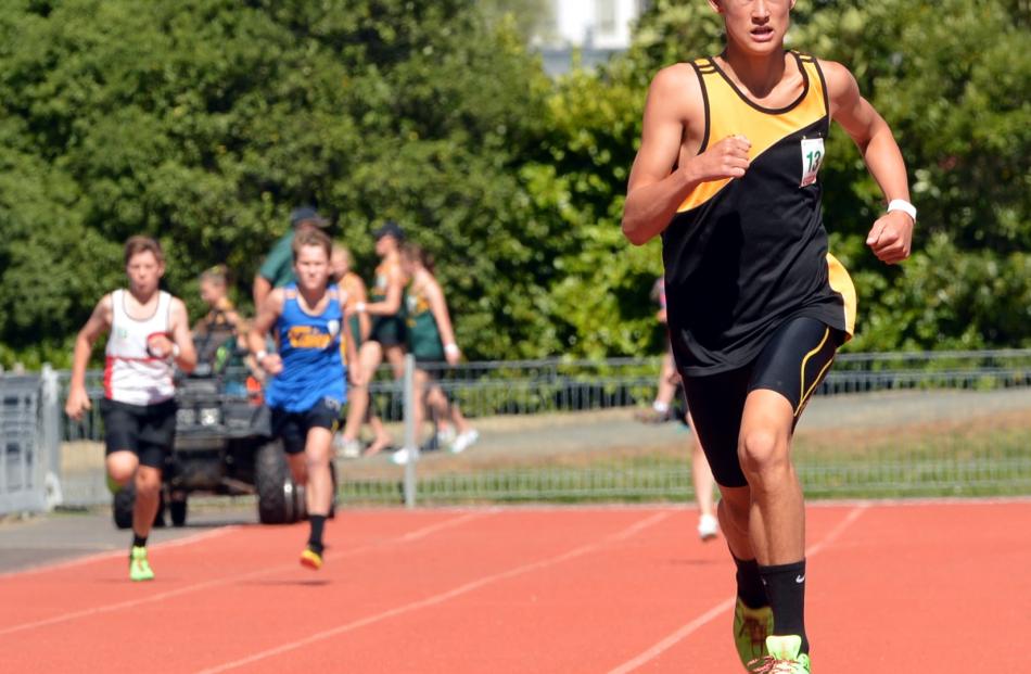 Nico Bowering, of Aspiring, leaves the rest of the field well behind in a grade 13 boys 400m heat.