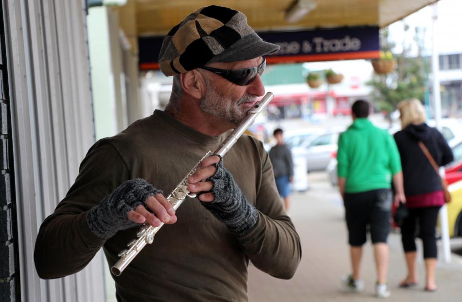 Hokitika busker Russell Price (59) thinks we live in a good country but tend 
...