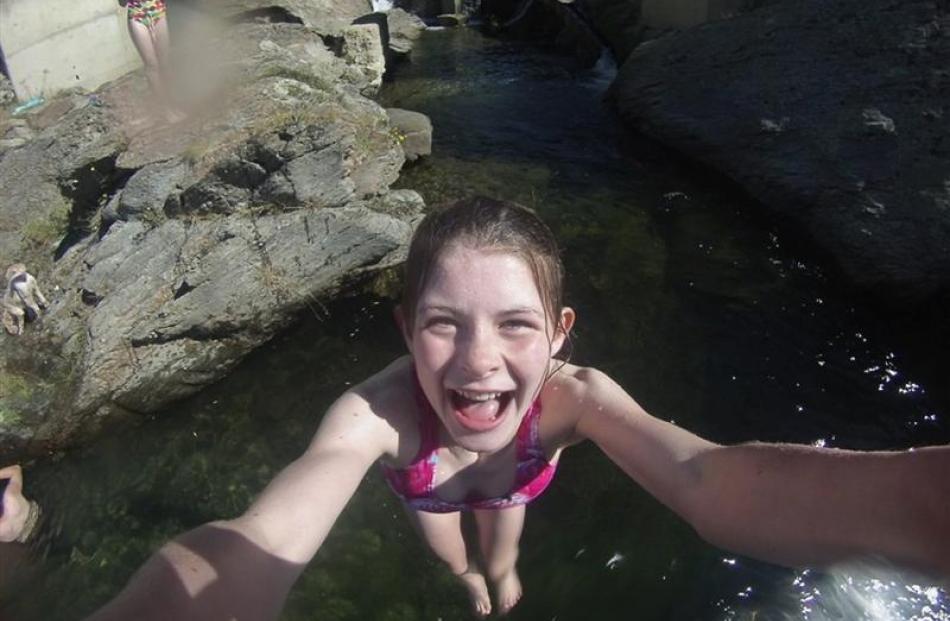 Madeline Bilkey's winning self-portrait captures a moment of sheer joy as she jumps into the...