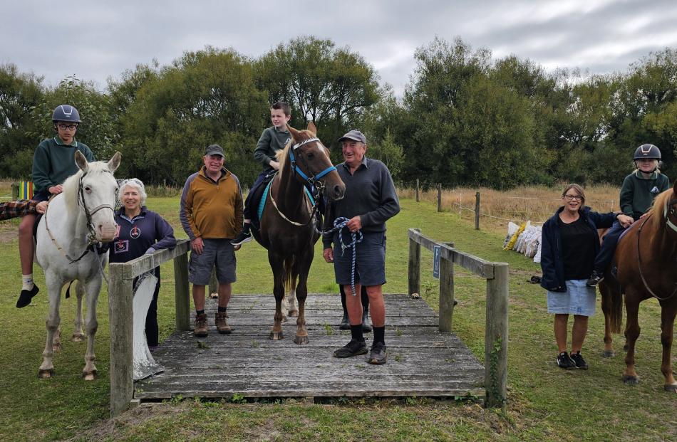 Pupils from Highfield Primary School enjoy a session with Timaru Riding for the Disabled volunteers.