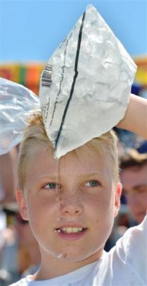 Jackson Flight (12), of Queenstown, cools down with an ice pack.