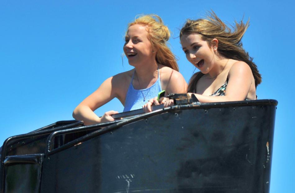Dunedin 15-year-olds (from left) Ariana Tutaki and Caitlin McKinlay hold on for dear life while...
