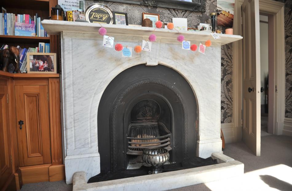The fireplace in the library was installed by previous owners.