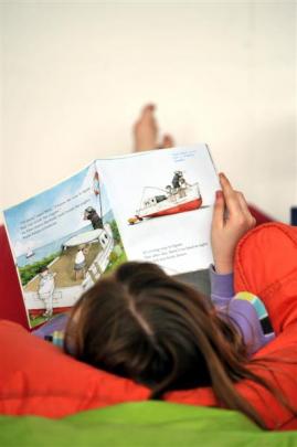 Devon Moffatt finds a quiet spot to stretch out and do a little reading.