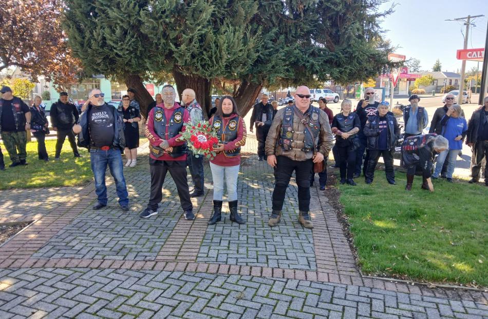 Riders carry out a brief ceremony and lay wreaths at the Milton War Memorial