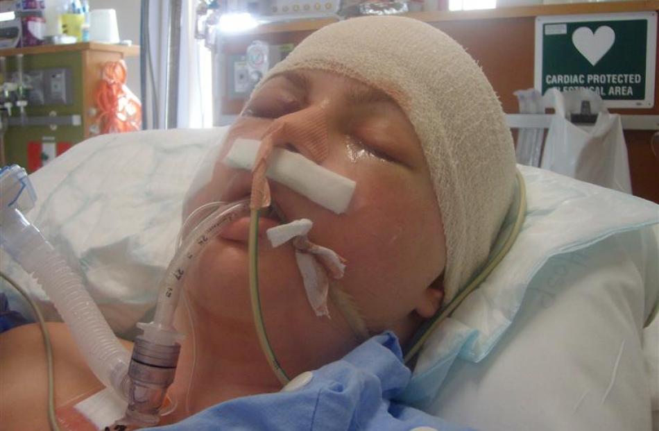 Sam King in  hospital after the 2011 attack.