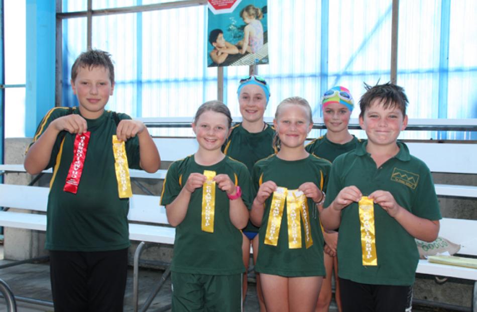 Fiordland swimmers who were part of the Country Team: Back L to R: Ruby Douglas 11 and Ana Hodson...