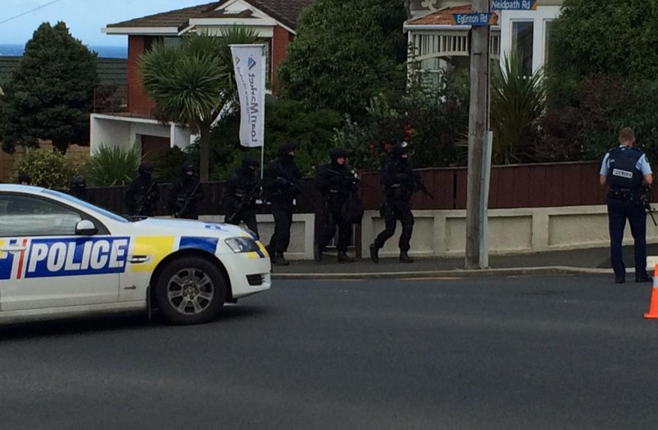 The Armed Offenders squad at the scene. Photo by Hamish McNeilly