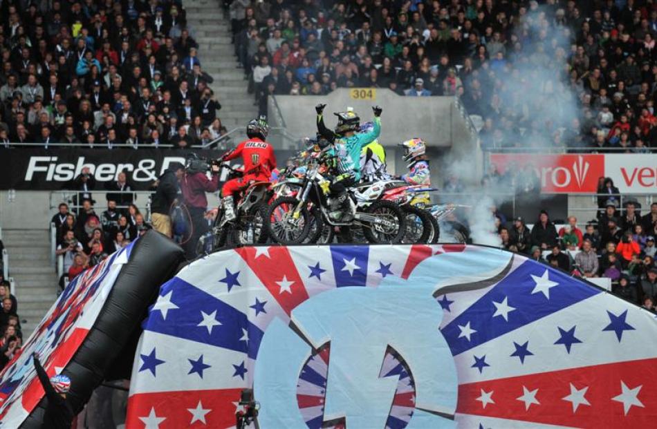 Nitro Circus riders celebrate on a landing ramp during the show. Photo by Linda Robertson.