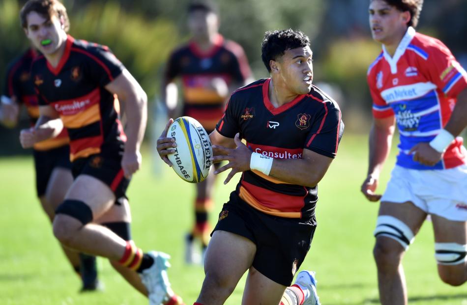 Zingari-Richmond first five Alay Faleafaga makes a break during the men's premier club rugby...