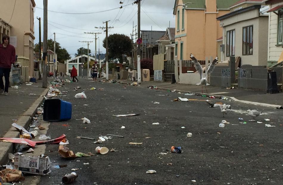 Glass and rubbish remain strewn over Hyde St yesterday.  Photo by Hamish McNeilly.