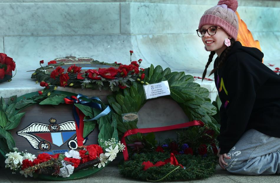 Lucy Densham, 10, of Dunedin during the 2025 Dawn Anzac Day Service at the Cenotaph in the Queens...