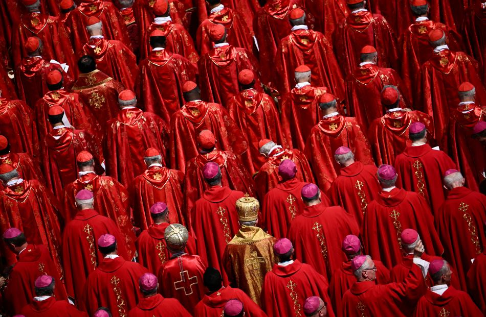 Members of the clergy attend the funeral Mass of the Pope, at the Vatican. PHOTO: REUTERS