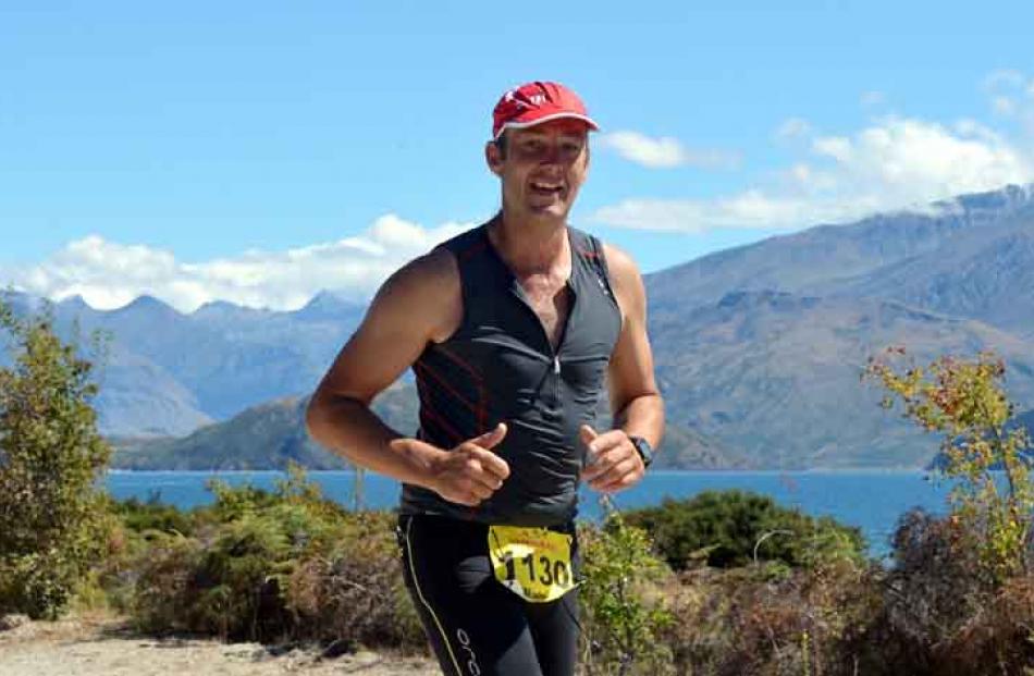 Mark Adam from Outram heads towards the Outlet at Lake Wanaka.