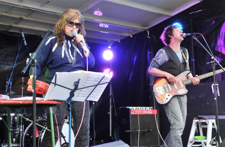 Azalia Snail and Dan West, of United States band LoveyDove, perform at   Bland Park. Photos by...