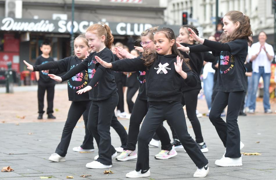 Younger members of the Black and White Dance Studio please the crowd.