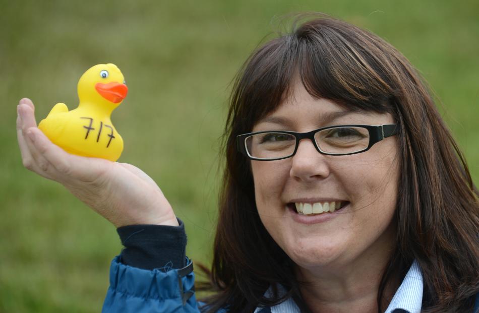Otago SPCA business development manager Kirsty Thomson holds the winning duck.