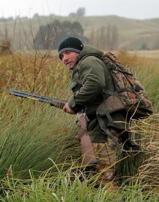 After watching from his ute for a while and listening for other shooters, Milton Newcomer Wayne...