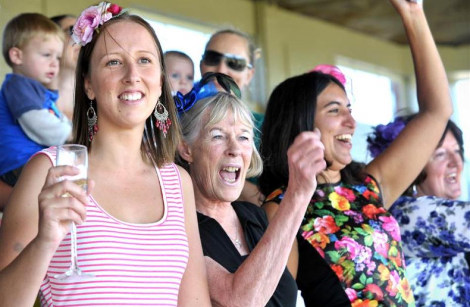 Celebrating as their horse crosses the line are (from left) Janelle Wilton, of Mosgiel, Jan...