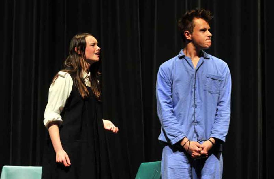 Tia Hibbert and Joshua Croucher, from Logan Park High School, in a scene from Measure for Measure.