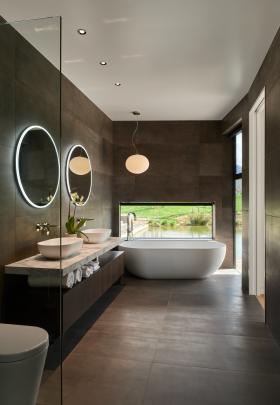 The bathrooms are a little darker and moodier than the rest of the house.


