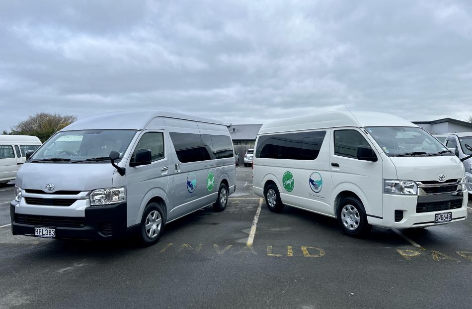 The brand new vans: (left) 12-seater minivan, (right) mobility van.