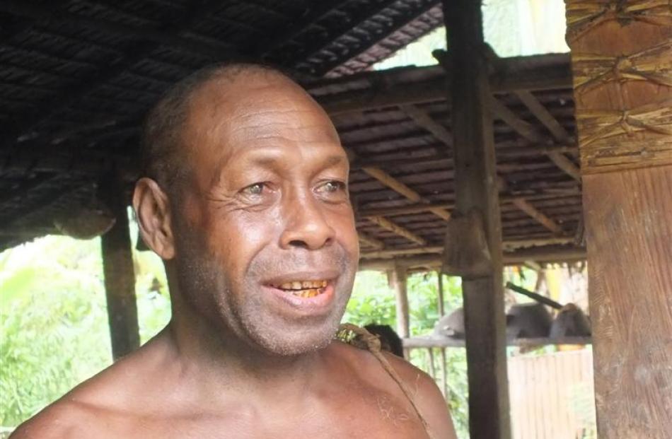 Primpo Pukukesa has developed a cultural village on the outskirts of Honiara. His red mouth is...