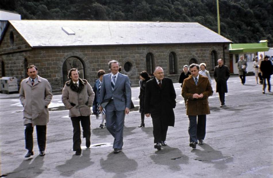 Otago Harbour Board chairman Cliff Skeggs (centre, in blue) with Prime Minister Robert Muldoon ...