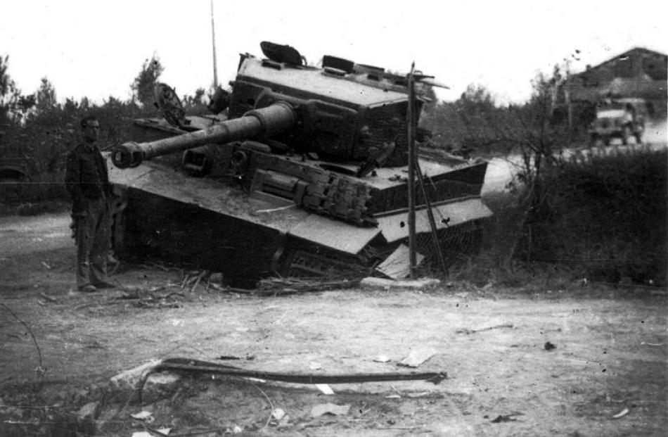 A damaged German Tiger Tank near Massa Lombarda in Italy.