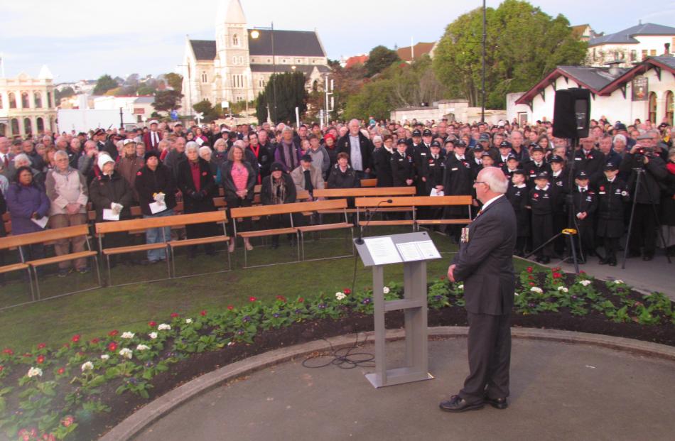 Returned Services Association representative John Longman addresses part of the estimated 3000...