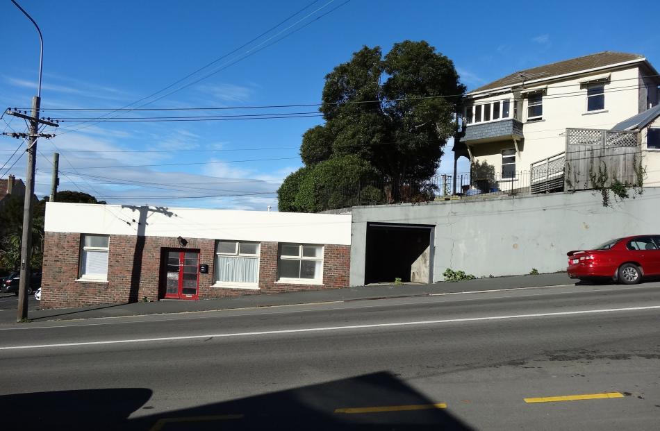 Before the roof and parapet were removed to make way for a second storey, the former corner store...