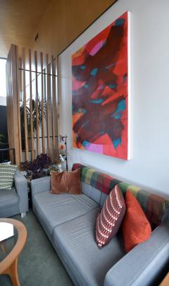 A vibrant abstract painting by Emily Crossen hangs on one of the living room walls. Mr Terpstra...