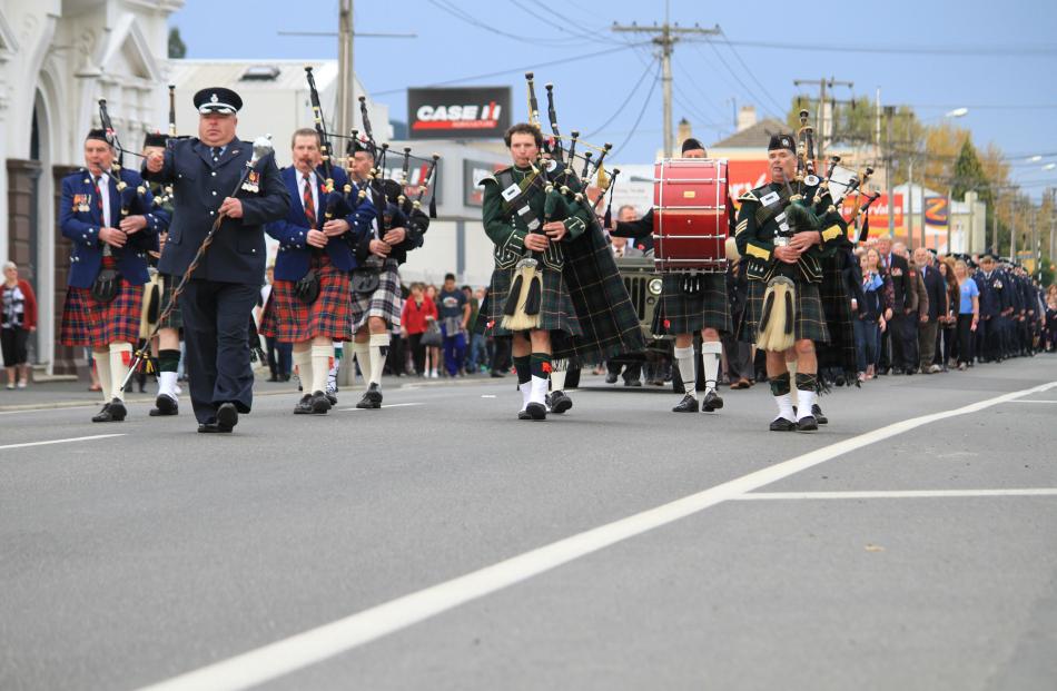The Bruce District Combined Pipe Band led the procession to the cenotaph in Milton.