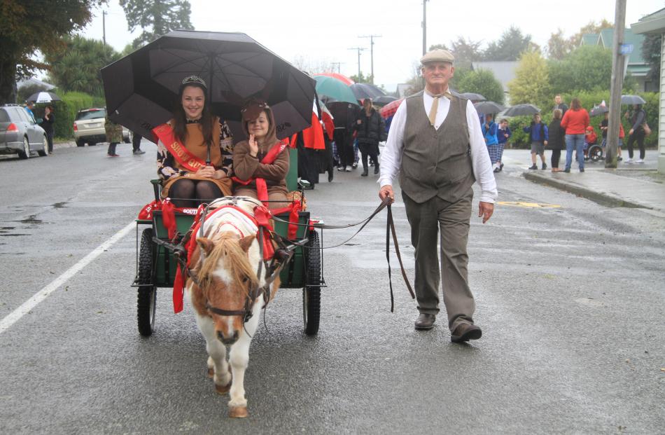 South Otago A&P Show 2014 show queen Georgia Scott, left, is joined by Ella McCarthy (7) for a...
