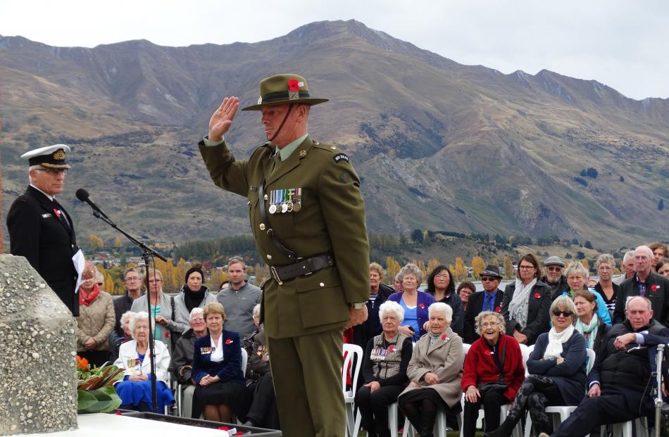 Wanaka man Major Ian Piercy, 2/4 Battalion Royal New Zealand Infantry Regiment, salutes at the...