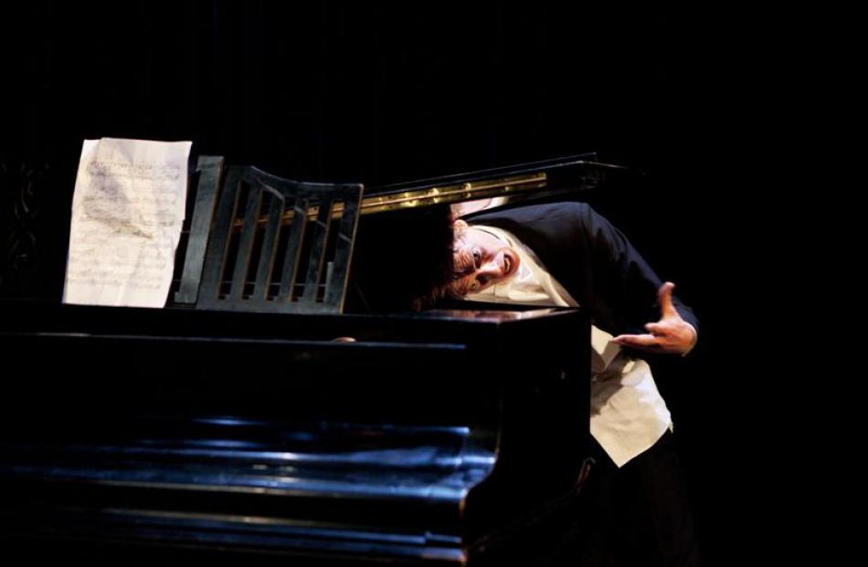 Tom Monckton in full clown mode during a performance of The Pianist. Photos supplied.
