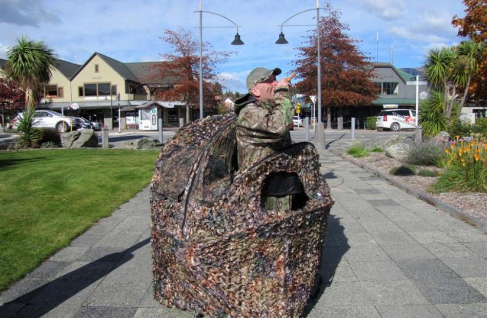 Wanaka sports shop owner Mark Sanders demonstrates, with his two-seat portable number, that a mai...