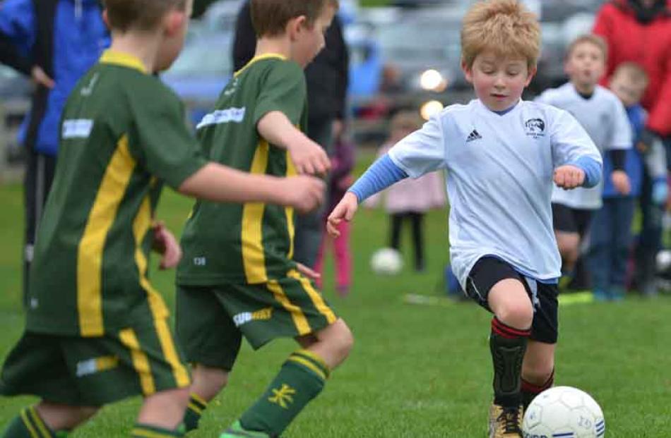 Fergus Oberlin-Brown, of the Roslyn Wakari Buckaroos, uses  his ball skills in the game against ...