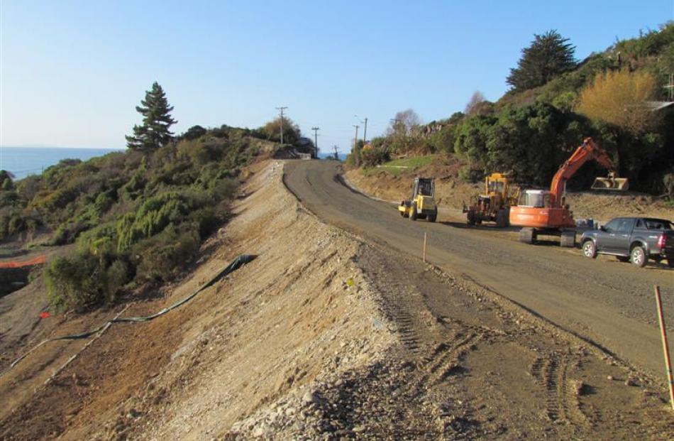 The final top coat of metal goes on and is compacted this week. Photo by David Bruce.