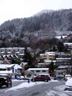 Winter's grip ... Snow coats central Queenstown and there's more forecast. PHOTO: DAVID WILLIAMS