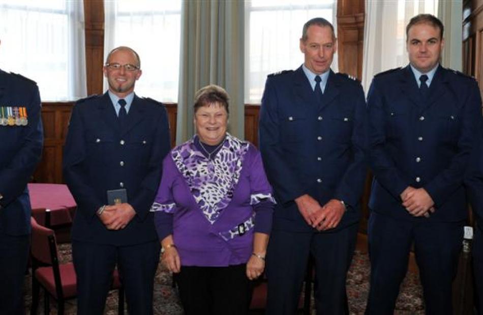 Attending a police award ceremony at Holy Cross College in Mosgiel last week are (from left)...