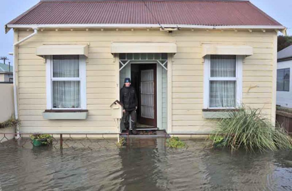 Geoffrey Cruden was fortunate not to be flooded in his house on Prendergast St.