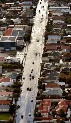 Bay View Rd was still under water yesterday. Photo by Stephen Jaquiery.